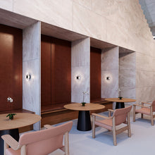 Load image into Gallery viewer, Meclisse™ LED Wall Light in restaurant.