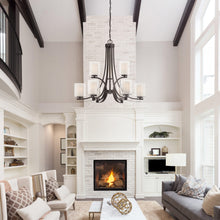 Load image into Gallery viewer, Parsons Studio Chandelier in living room.