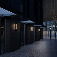 Load image into Gallery viewer, Heliograph LED Wall Light in Outside Area.