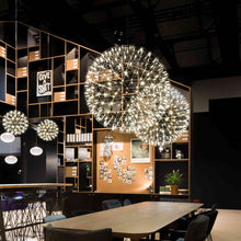 Load image into Gallery viewer, Raimond II LED Pendant Light in library.