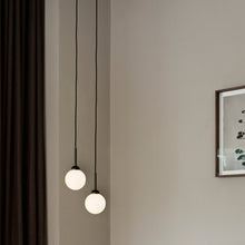 Load image into Gallery viewer, Apiales Pendant Light in living room.