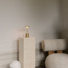 Load image into Gallery viewer, Blossi LED Mini Portable Table Lamp in living room.