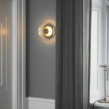 Load image into Gallery viewer, Blossi LED Wall Light in living room.