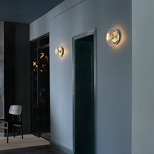 Load image into Gallery viewer, Blossi LED Wall Light in living room.