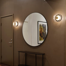 Load image into Gallery viewer, Blossi LED Wall Light in living room.