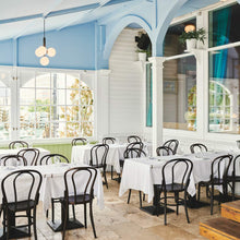 Load image into Gallery viewer, Miira Multi Pendant Light in restaurant.