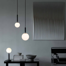 Load image into Gallery viewer, Miira Pendant Light in living room.