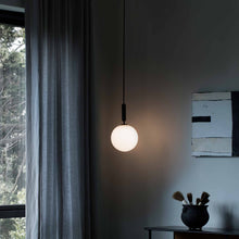 Load image into Gallery viewer, Miira Pendant Light in living room.