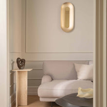 Load image into Gallery viewer, Sasi LED Wall Light in living room.