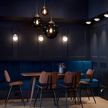 Load image into Gallery viewer, Globe Pendant Light in restaurant.