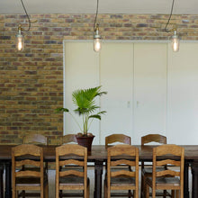 Load image into Gallery viewer, Well Pendant Light in dining room.