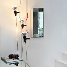 Load image into Gallery viewer, Parentesi Floor Lamp in living room.