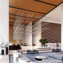 Load image into Gallery viewer, Labyrinth Square LED Pendant Light in lobby.