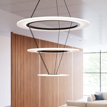 Load image into Gallery viewer, Arctic Rings™ Triple Ring LED Pendant Light in living room.