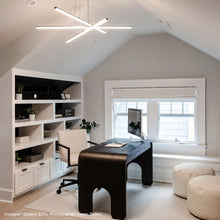 Load image into Gallery viewer, Stix LED Pendant Light in living room.
