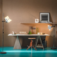 Load image into Gallery viewer, Triedro Floor Lamp in living room.