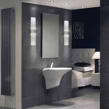Load image into Gallery viewer, Baya LED Wall Light in bathroom.