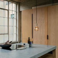 Load image into Gallery viewer, Cylindrical Pendant Light in kitchen.