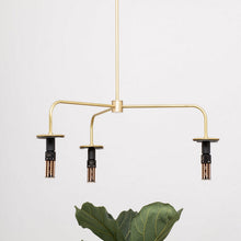 Load image into Gallery viewer, Light Engine I Candelabra Base T9 Type LED Bulb in living room.