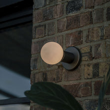 Load image into Gallery viewer, Lochan Wall Light in Outside Area.