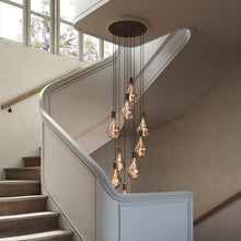 Load image into Gallery viewer, Nine Multi Light Pendant Light in living room.