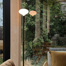 Load image into Gallery viewer, Oval II Medium Base R65 Type LED Bulb in living room.