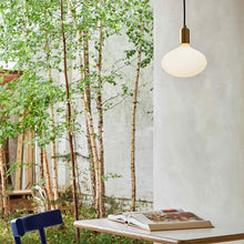 Load image into Gallery viewer, Oval II Medium Base R65 Type LED Bulb in Outside Area.