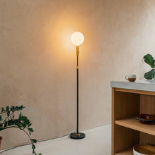 Load image into Gallery viewer, Poise Sphere V LED Adjustable Floor Lamp in living room.