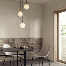 Load image into Gallery viewer, Sphere IV Medium Base G47 Type LED Bulb in living room.