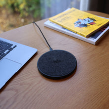 Load image into Gallery viewer, The Muse Wireless Charger in living room.