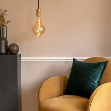 Load image into Gallery viewer, Voronoi II Medium Base A52 Type LED Bulb in living room.