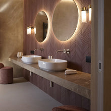 Load image into Gallery viewer, Osman Wall Light in bathroom.