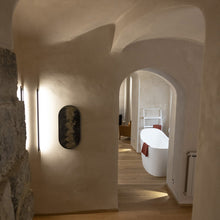 Load image into Gallery viewer, Thula Orientable LED Wall Light in bathroom.