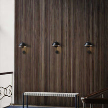 Load image into Gallery viewer, Flowerpot VP8 Wall Light in living room.