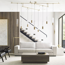 Load image into Gallery viewer, Captra Pendant Light in living room.