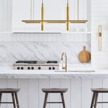 Load image into Gallery viewer, Stagger Halo LED Linear Pendant Light in kitchen.