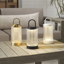Load image into Gallery viewer, Tawa LED Table Lamp in Outside Area.