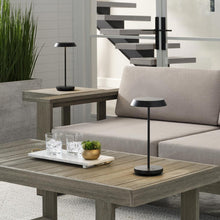 Load image into Gallery viewer, Tepa LED Table Lamp in Outside Area.