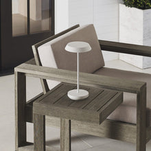 Load image into Gallery viewer, Tepa LED Table Lamp in Outside Area.