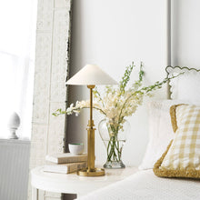 Load image into Gallery viewer, Hargett Table Lamp in bedroom.