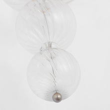 Load image into Gallery viewer, Talia Swirled Glass Wall Light in Detail.