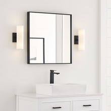 Load image into Gallery viewer, Capalino Wall Light in bathroom.