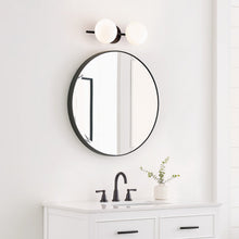 Load image into Gallery viewer, Lune LED Vanity Wall Light in bathroom.