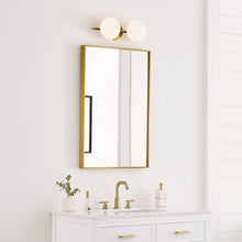 Load image into Gallery viewer, Lune LED Vanity Wall Light in bathroom.