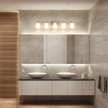 Load image into Gallery viewer, Cadoc Bath Vanity Light in bathroom.