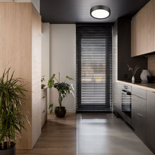 Load image into Gallery viewer, Kawan LED Flush Mount Ceiling Light in living room.