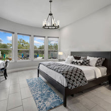 Load image into Gallery viewer, Titus Chandelier in bedroom.
