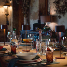 Load image into Gallery viewer, Olivia Pro LED Table Lamp in Outside Area.