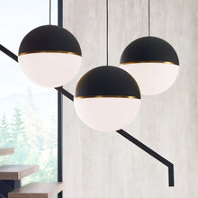 Load image into Gallery viewer, Akova Grande Pendant Light in living room.