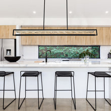 Load image into Gallery viewer, Capuccio LED Linear Pendant Light in living room.